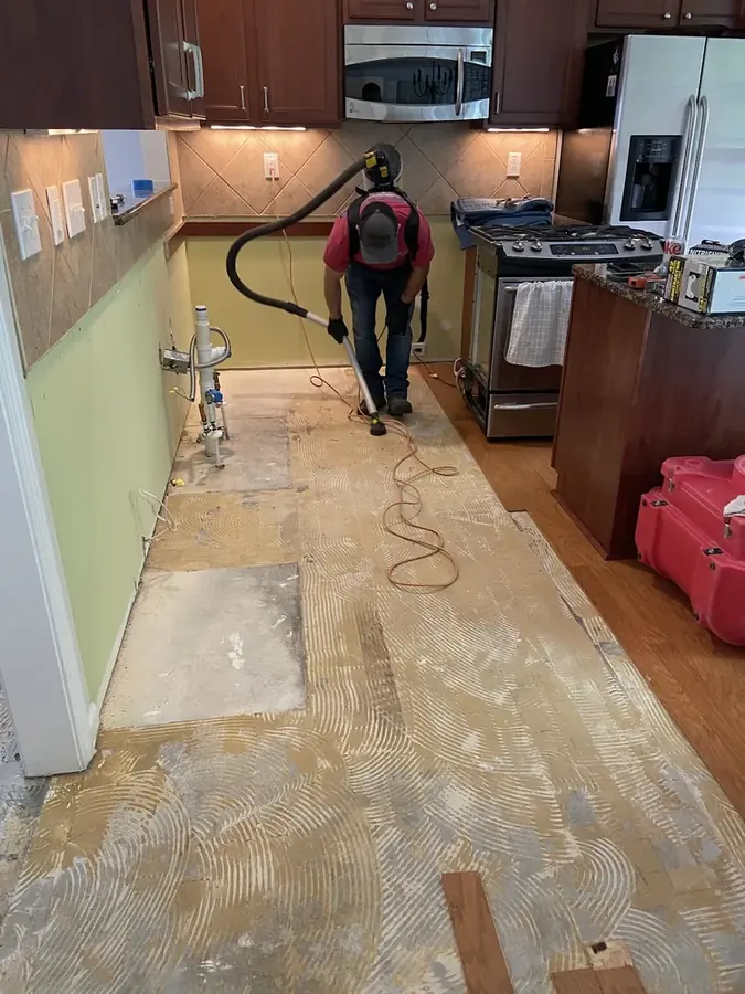 Washing machine supply line leak flooding a Cary laundry room